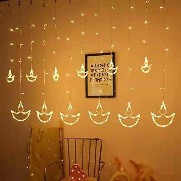 QUACE 138 LEDs 2.49 m Yellow Flickering, Steady Diya Ri...